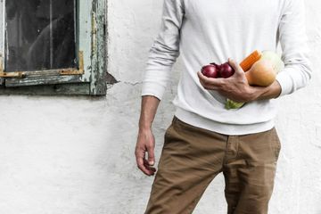 A man bought vegetables to make healthy meals for his intermittent fasting journey A man bought veggies to cook healthy food for IF